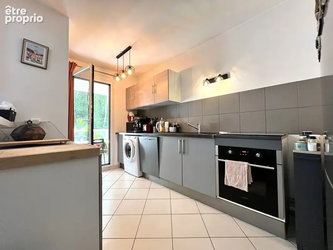 Appartement T3, avec balcon, ascenseur et parking au calme à SAINT JEAN DE BRAYE - photo 5