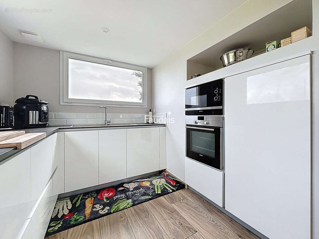 Maison 70 m² à Surville  - photo 4