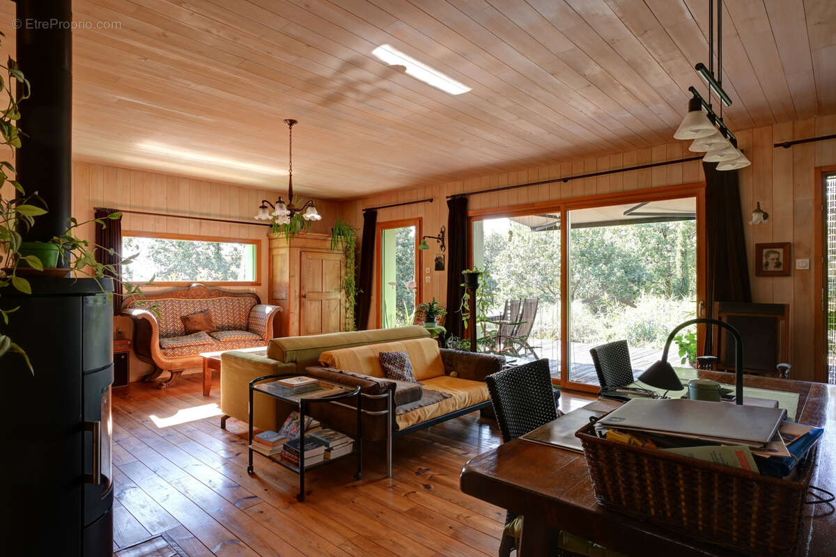 Maison bioclimatique à ossature bois avec gîte, piscine naturelle et autonomie énergétique - photo 5