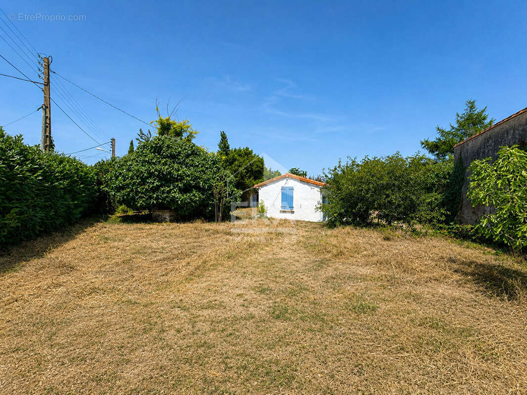 Opportunité rare : maison et terrain constructible de 650 m² - photo 4