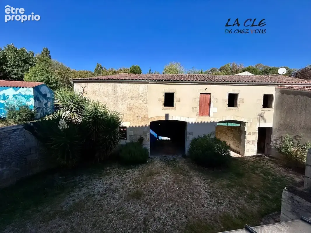 Maison ancienne avec local commercial - photo 8