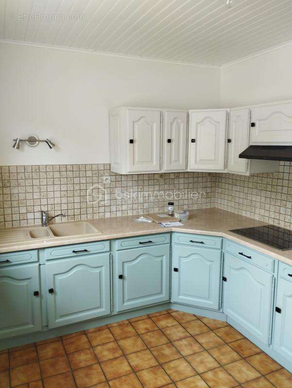 Maison de plain-pied en ville - photo 2