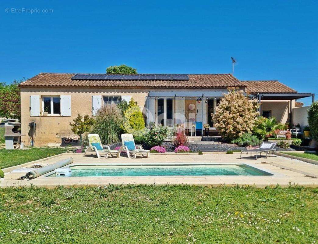 Maison à SAINT-JULIEN-LES-ROSIERS