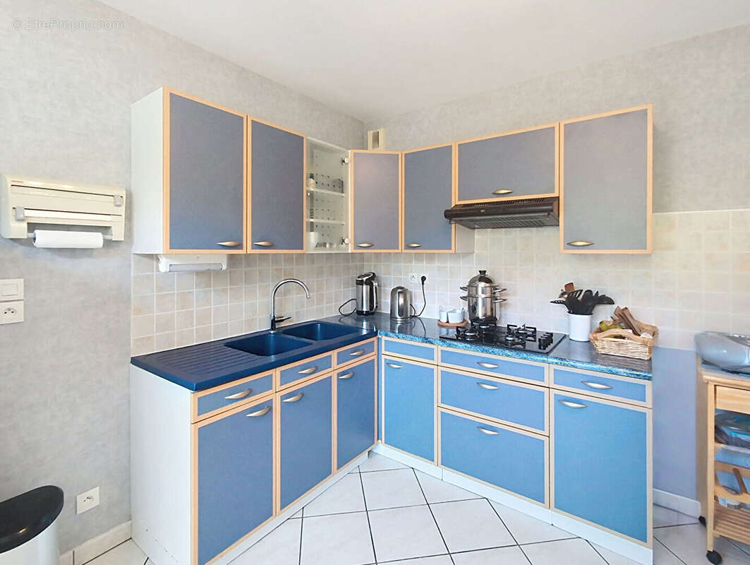 Appartement T3 - 64.37 m2 avec cave, balcon et parking - photo 9