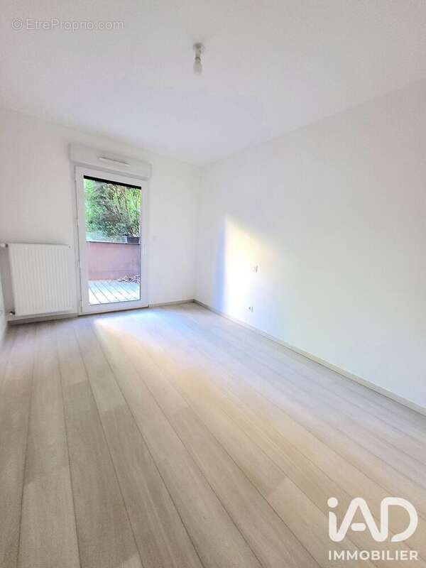 Appartement 52 m² à Saint-Jean-Bonnefonds  - photo 4