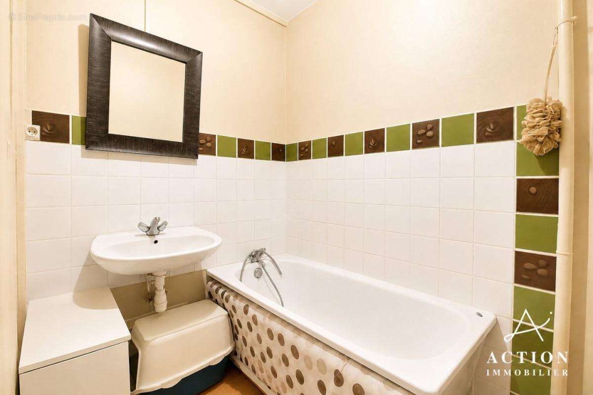 Appartement t3 - 69 m² - 2 chambres - cave - photo 4