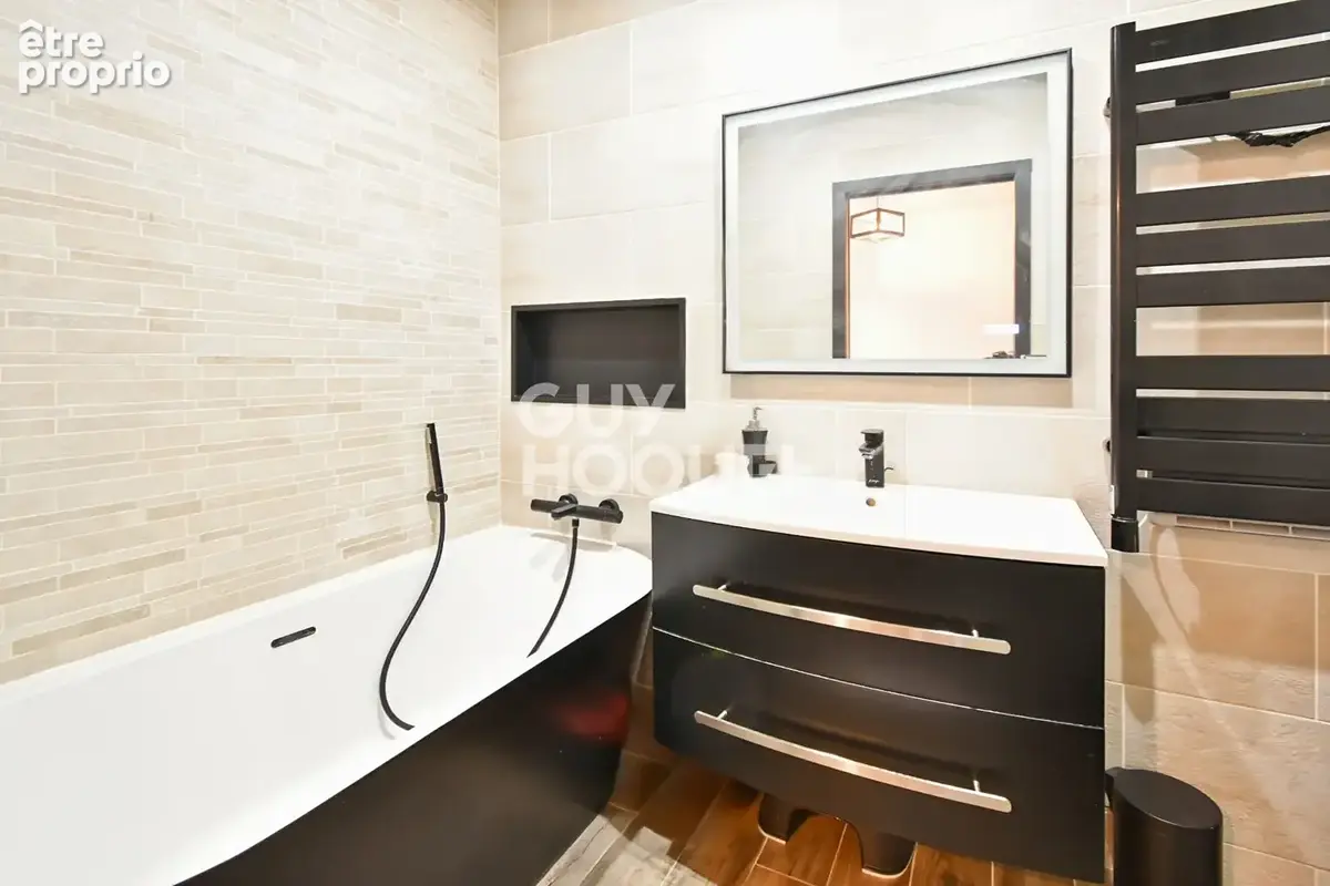 Superbe duplex de 75 m² avec terrain privatif de 40 m², 3 chambres dont suite parentale ? 3 stationnements - photo 7
