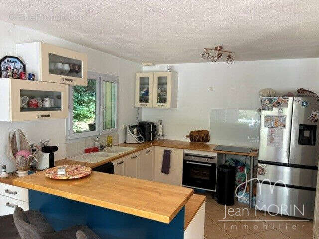 Maison 116 m² à Saint-Julien-En-Saint-Alban  - photo 4