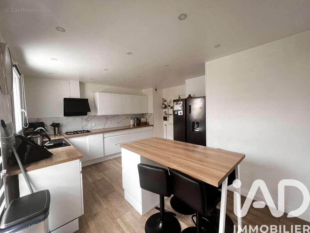 Photo 2 - Maison à SAVIGNY-LE-TEMPLE