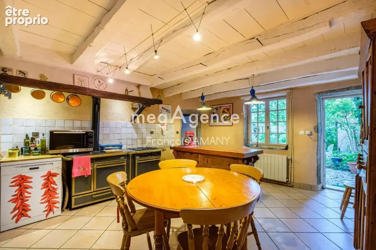 Une maison de charme au cœur de Dommartin - photo 7