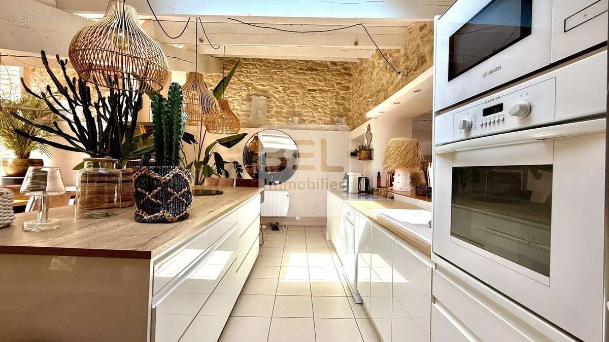 Maison à LAUDUN-L'ARDOISE