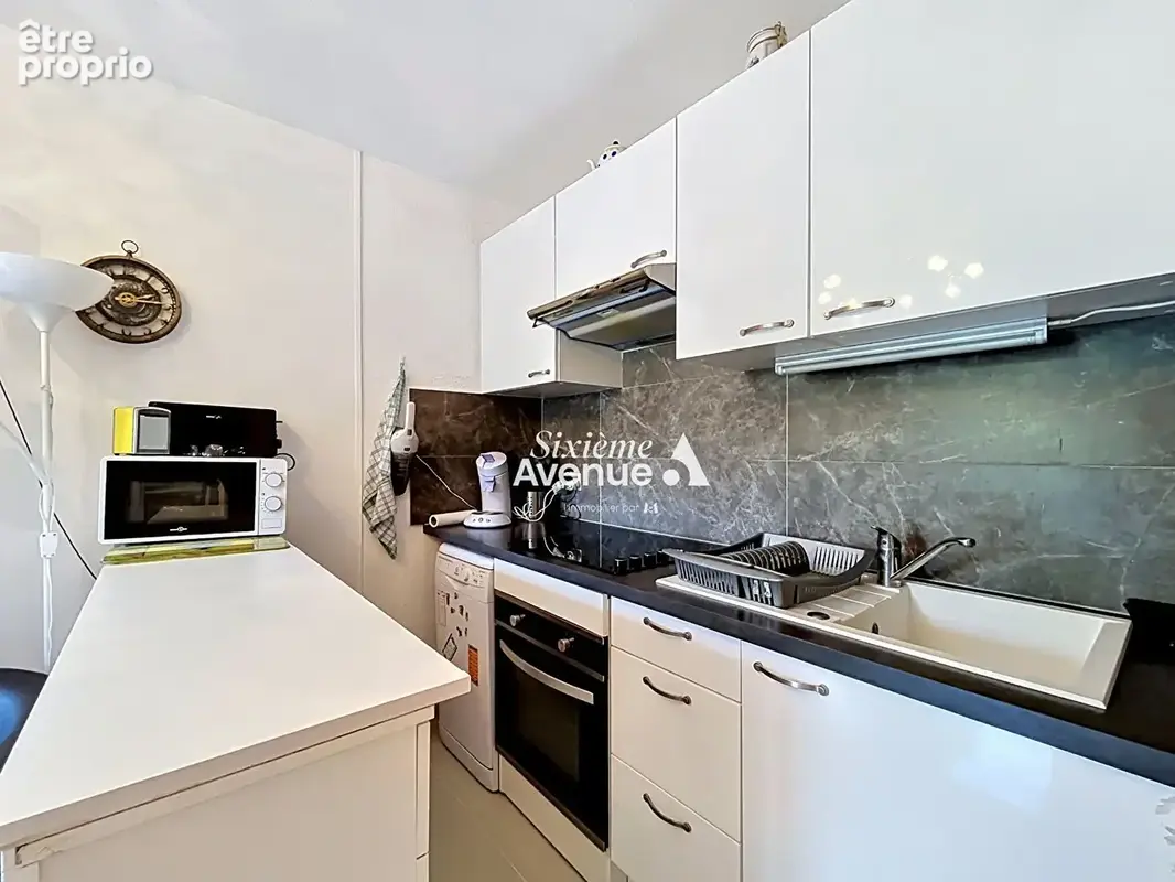 A VENDRE A MANDELIEU appartement 2 pièces en rez-de-jardin avec cave et place privative - photo 8