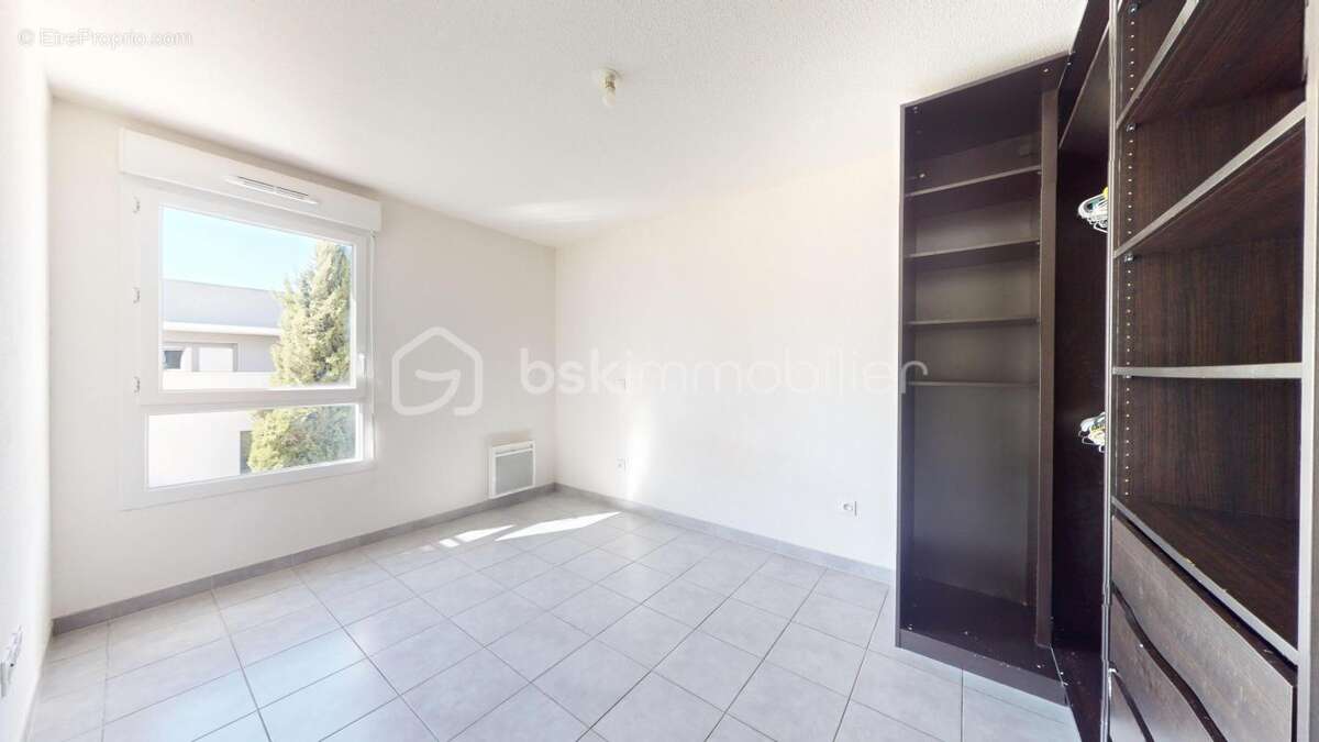 Appartement T3 avec terrasse, ascenseur et place de parking - photo 9
