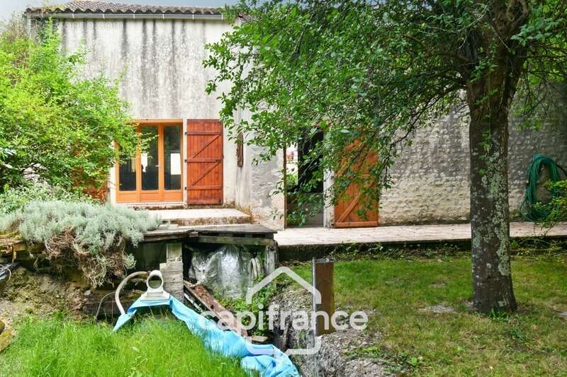 Maison charentaise à vendre 4 pièces LES EGLISES D'ARGENTEUIL (17)avec garage sur 1089m² de jardin arboré - photo 6