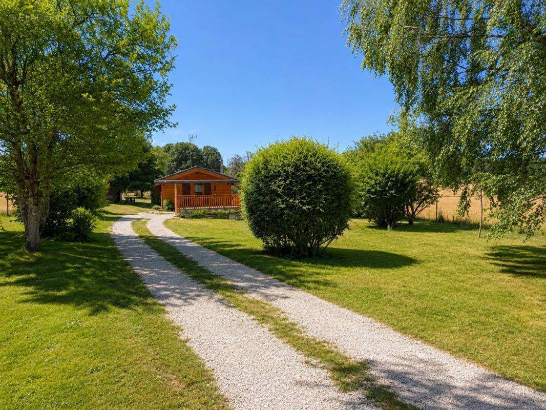 Confortable chalet sur grand parc arboré - photo 13