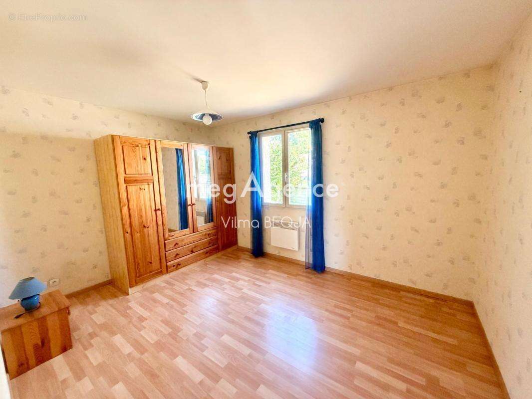Maison de plain-pied 103 m² – 4 chambres – Garage – Terrain de 1 100 m² - photo 12