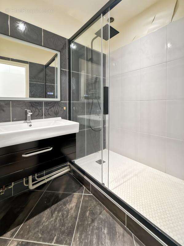Appartement 106 m² à Paris-9e  - photo 9