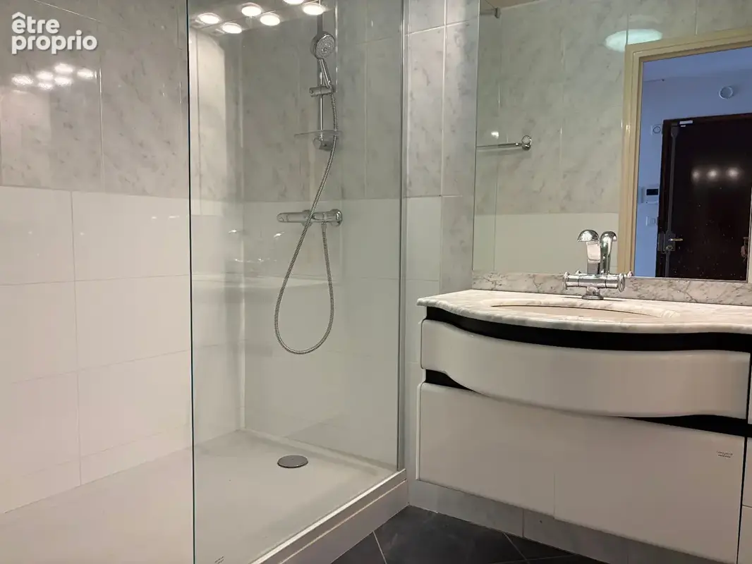 Appartement de 64,76 m² au 3ème étage d'une residence de standing - photo 9