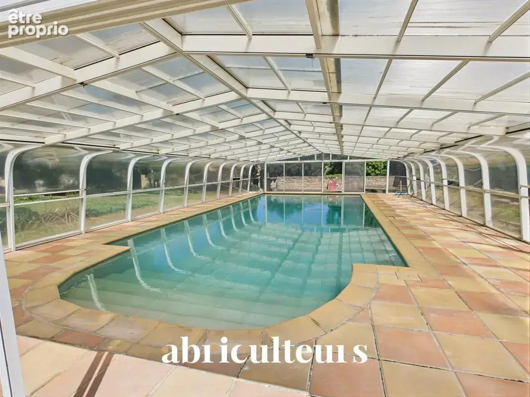 Maison familiale en pierre à vendre à Grans, sur un jardin arboré de 254 m² (13250) - photo 5
