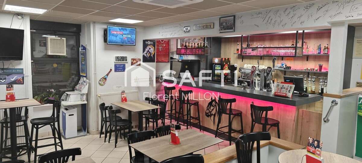 Photo 2 - Commerce à TULLINS