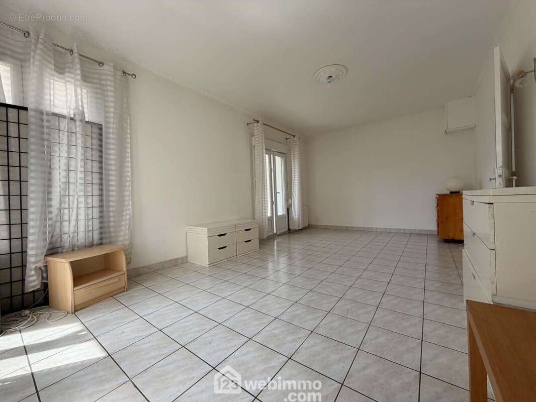 Le séjour de 25 m2, - Maison à CHATELLERAULT