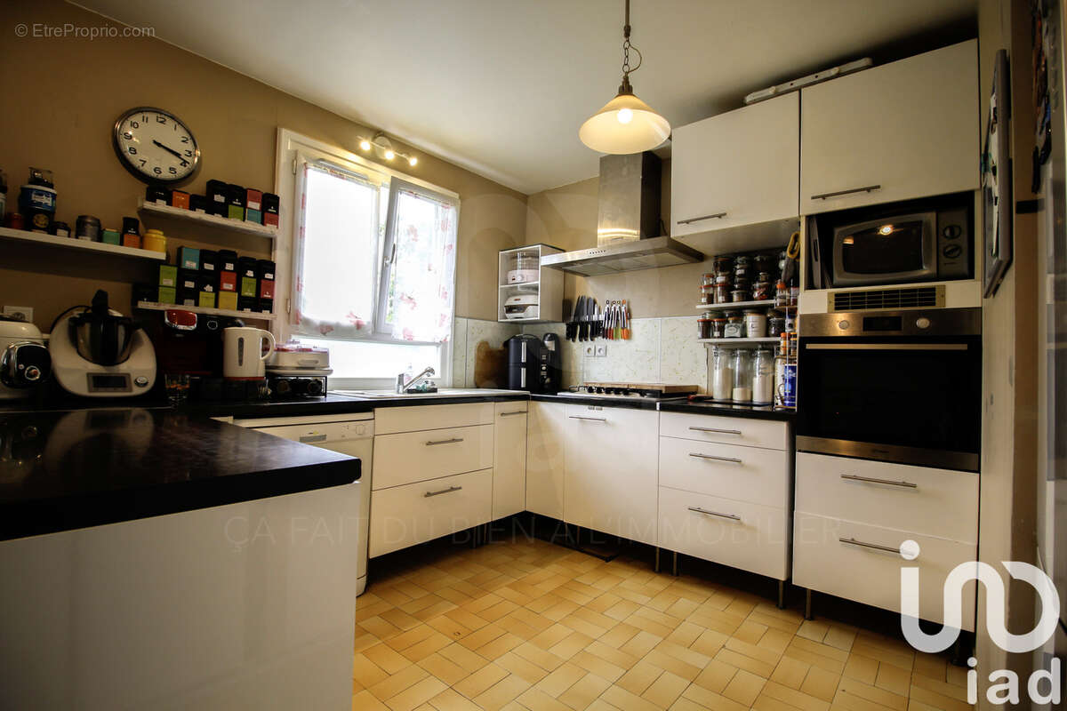 Maison 107 m² à Garennes-Sur-Eure  - photo 7