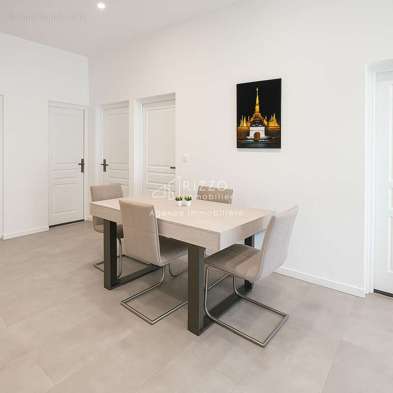 PERON   Appartement T4 avec terrasse, jardin et 2 parkings - photo 7