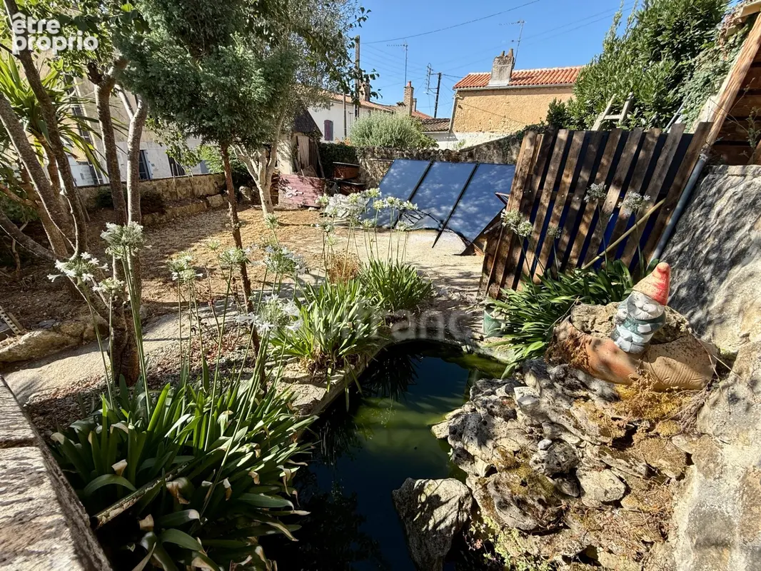  CHAMPDENIERS – Maison de 123 m² au cœur du bourg, 3 chambres, jardin et garage - photo 17