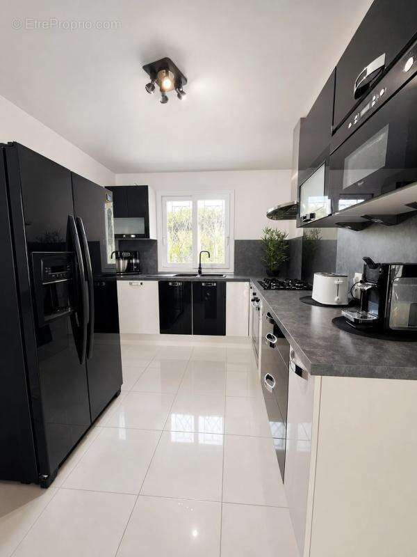 Maison de 7 pièces de 150 m² à Saint-Brice - photo 6