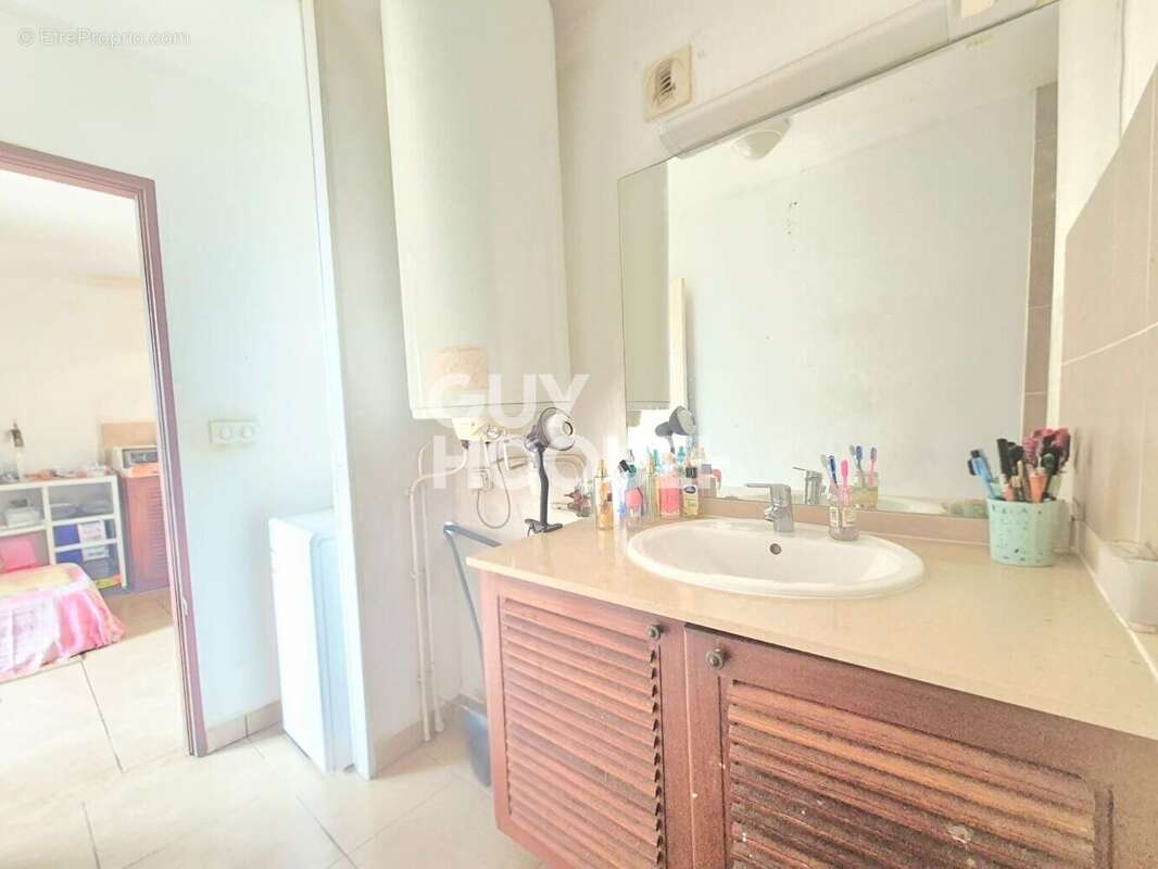 INVESTISSEUR - T2 loué 31.60m² - photo 5