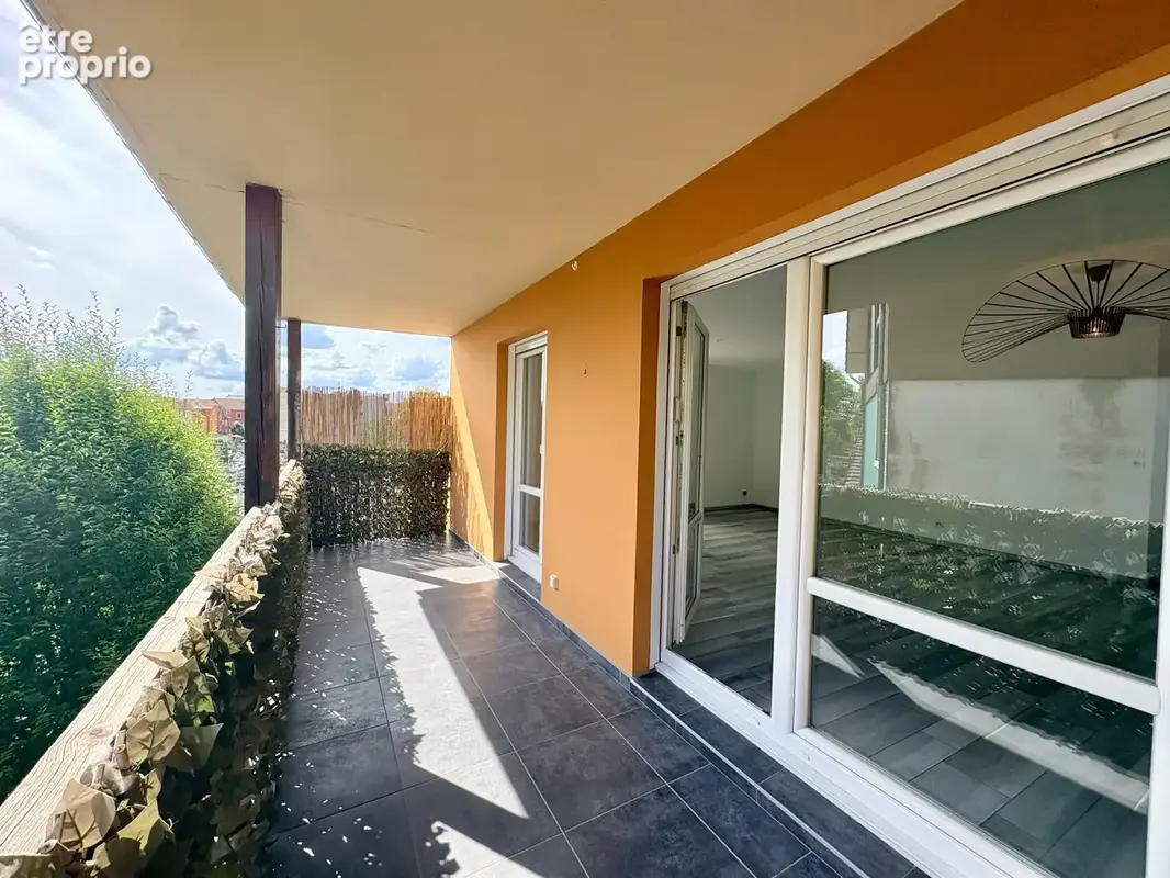 A BELFORT : Magnifique appartement au calme avec double balcon, garage et cave - photo 3