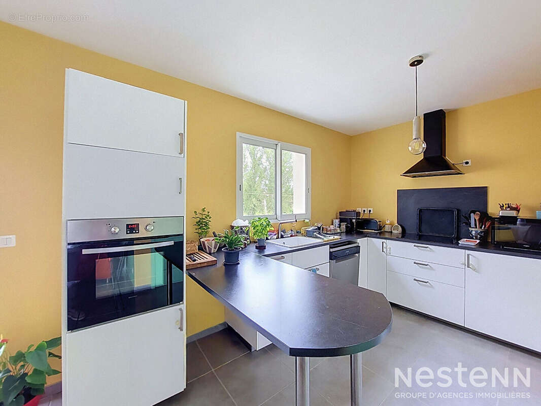 A Vendre Maison contemporaine de plain-pied avec trois chambres, garage et jardin à Condom - photo 3