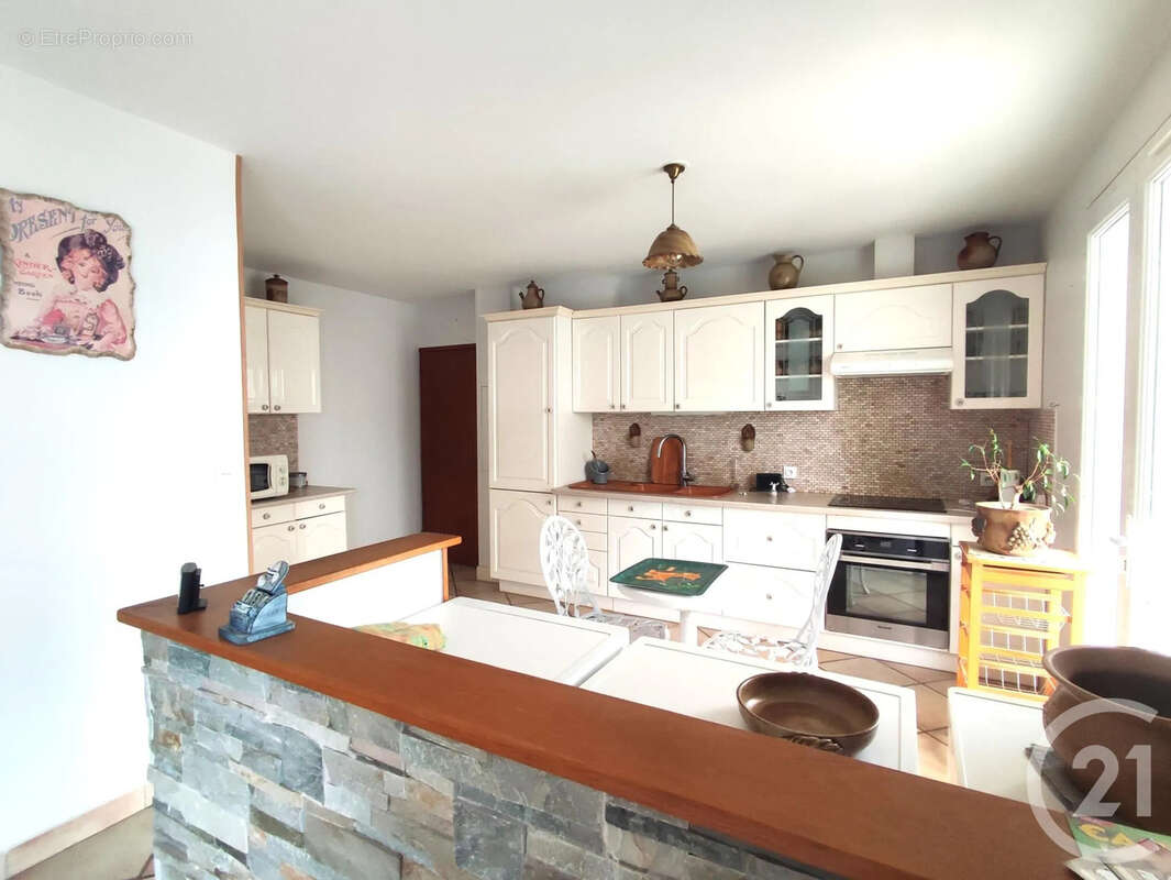 Maison 115 m² à Saint-Amand-En-Puisaye  - photo 6