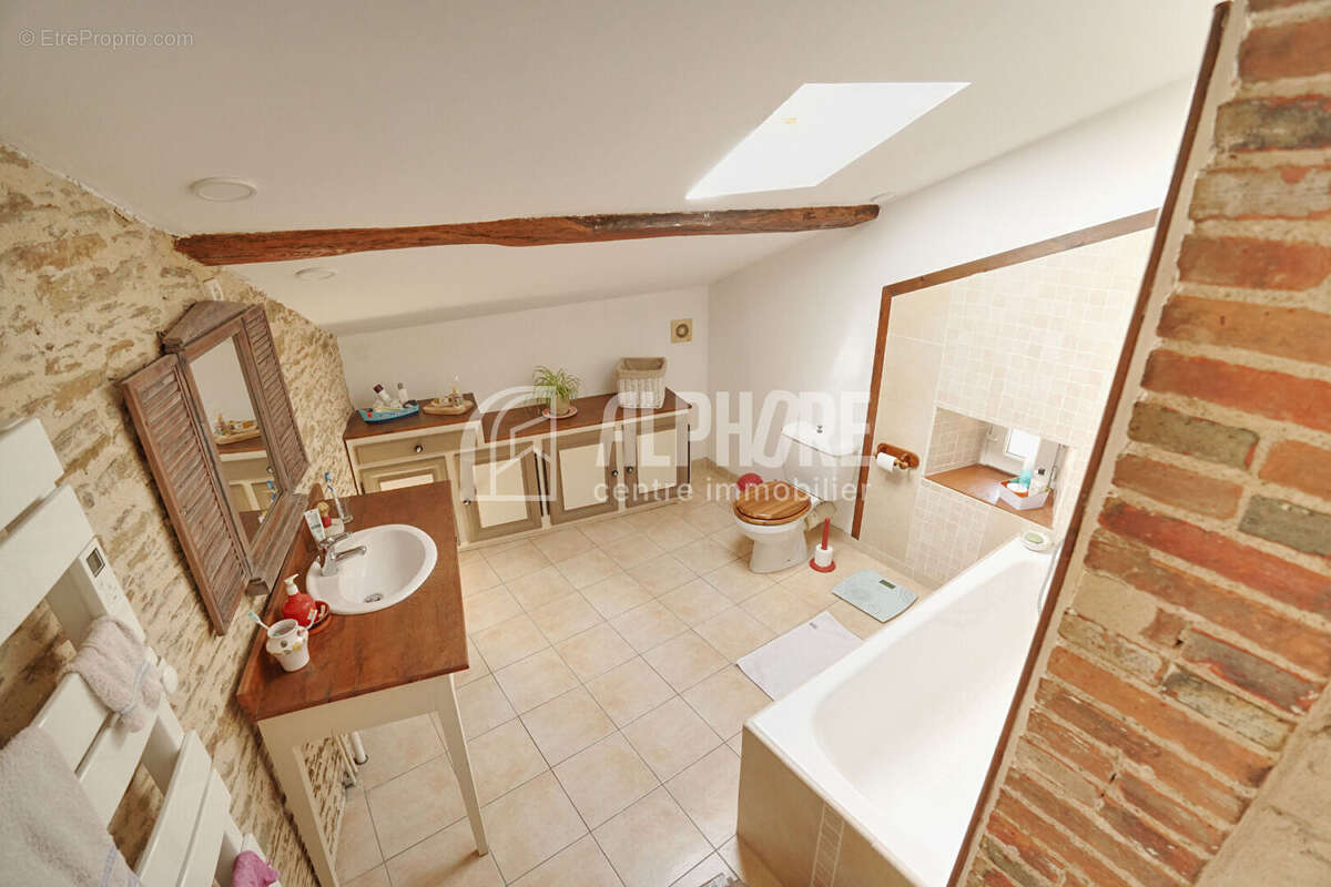 Maison 129m² - 3 chambres - terrain de 1666m² - Rives De L Yon - photo 11