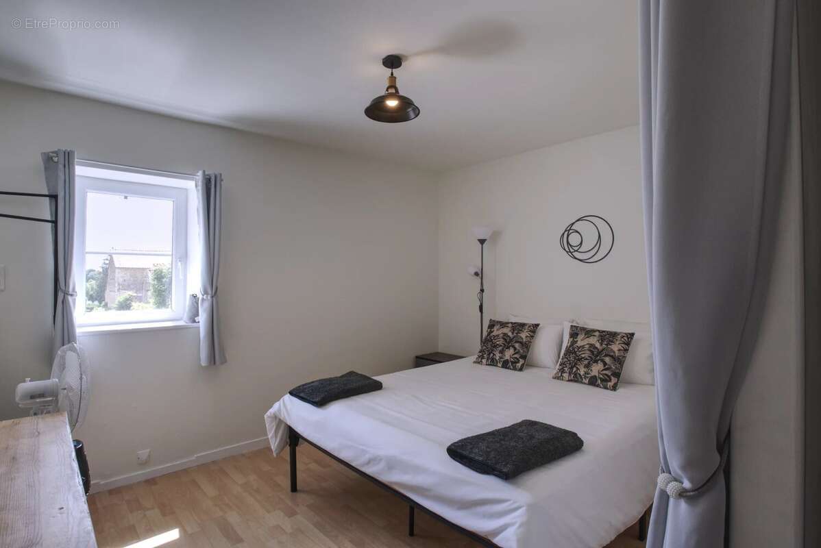 Maison en pierre spacieuse avec grand gîte (4/6 chambres) au cœur d’un village recherché - photo 7