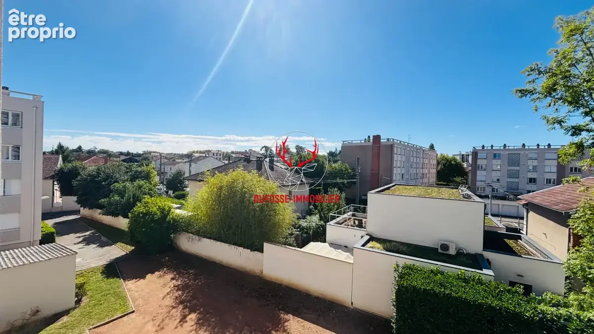 Appartement T3 traversant 78m² avec balcon, cave et garage - Bron (69500) - photo 5