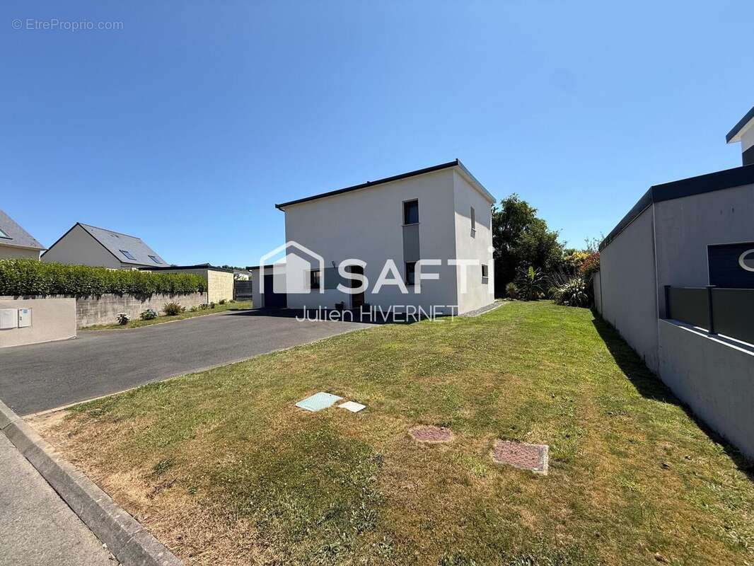 Photo 2 - Maison à LANDIVISIAU