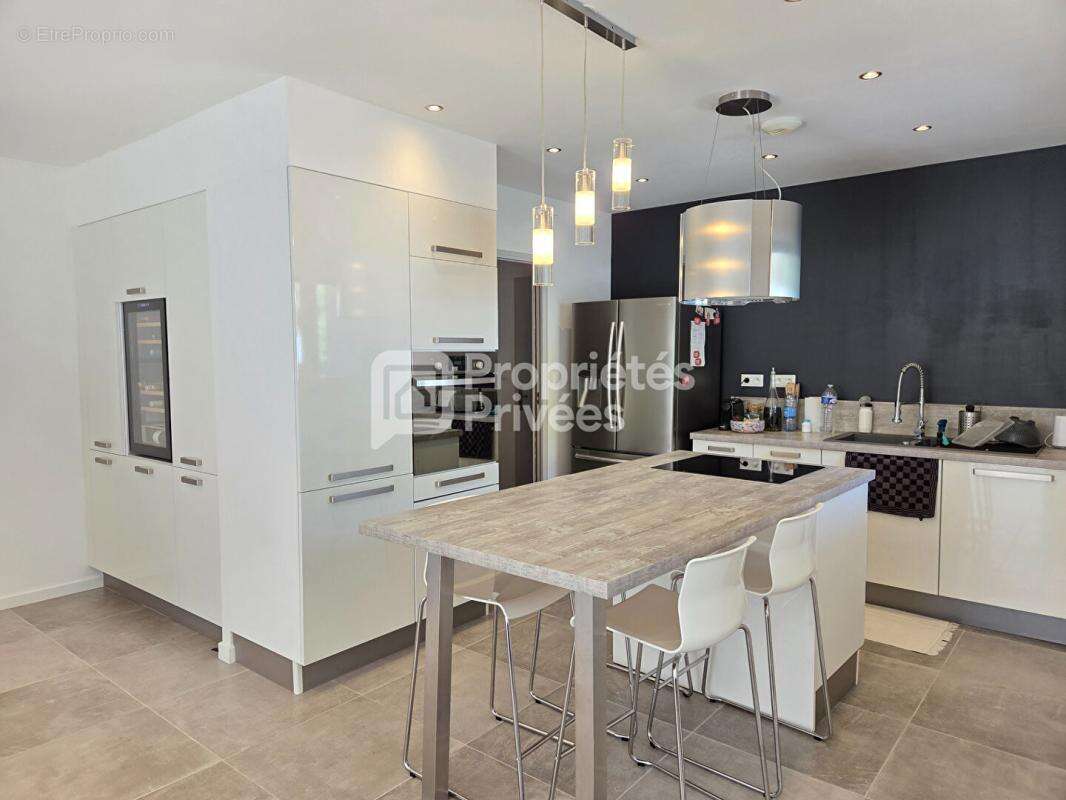 Maison 4 pièces 110 m2 - photo 5