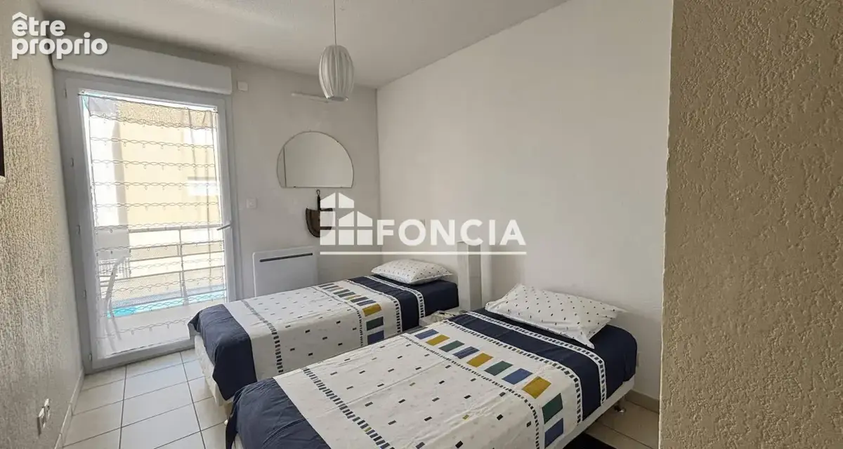 FRONTIGNAN T2 TERRASSE, 2 parkings privés- Piscine - photo 6