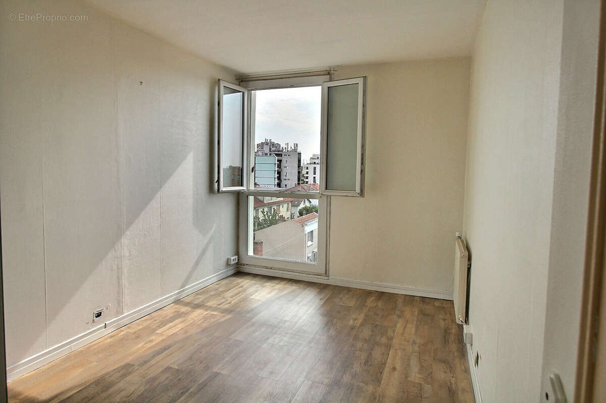 Trois pieces - quartier marceau - dernier etage - photo 6