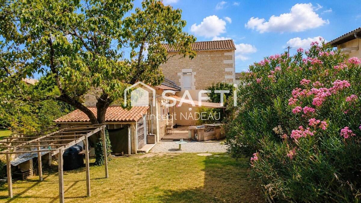 Photo 1 - Maison à L'ISLE-D'ESPAGNAC