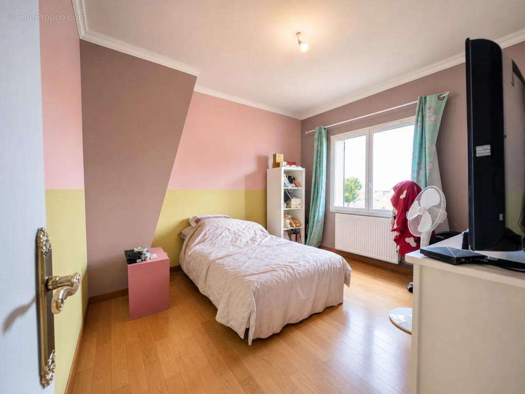 Maison familiale de 168m² avec jardin à Mézières-sur-Seine - photo 9
