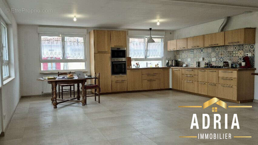 Pièce de vie de 45 m² - Maison à VIGY