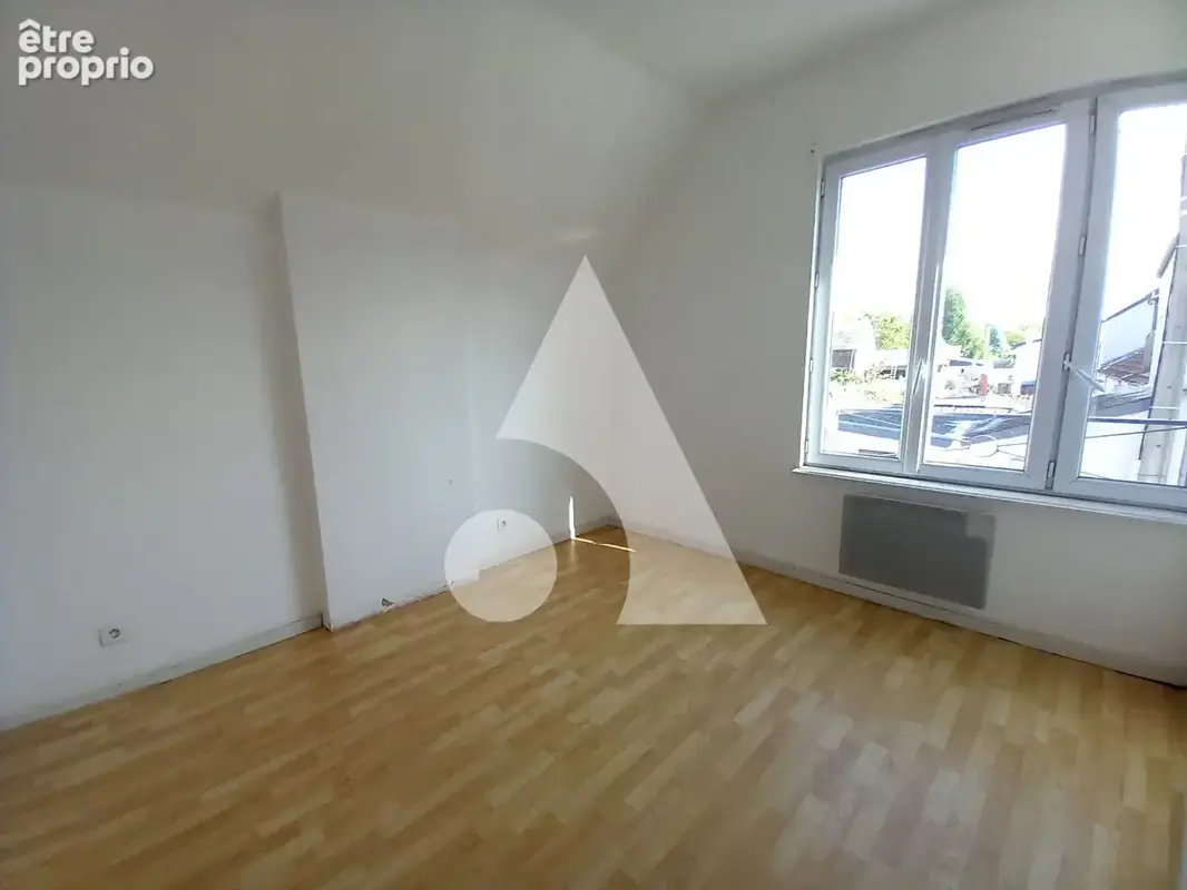 Immeuble de rapport à Maubeuge : 5 logements, un commerce et un potentiel locatif à étudier - photo 9