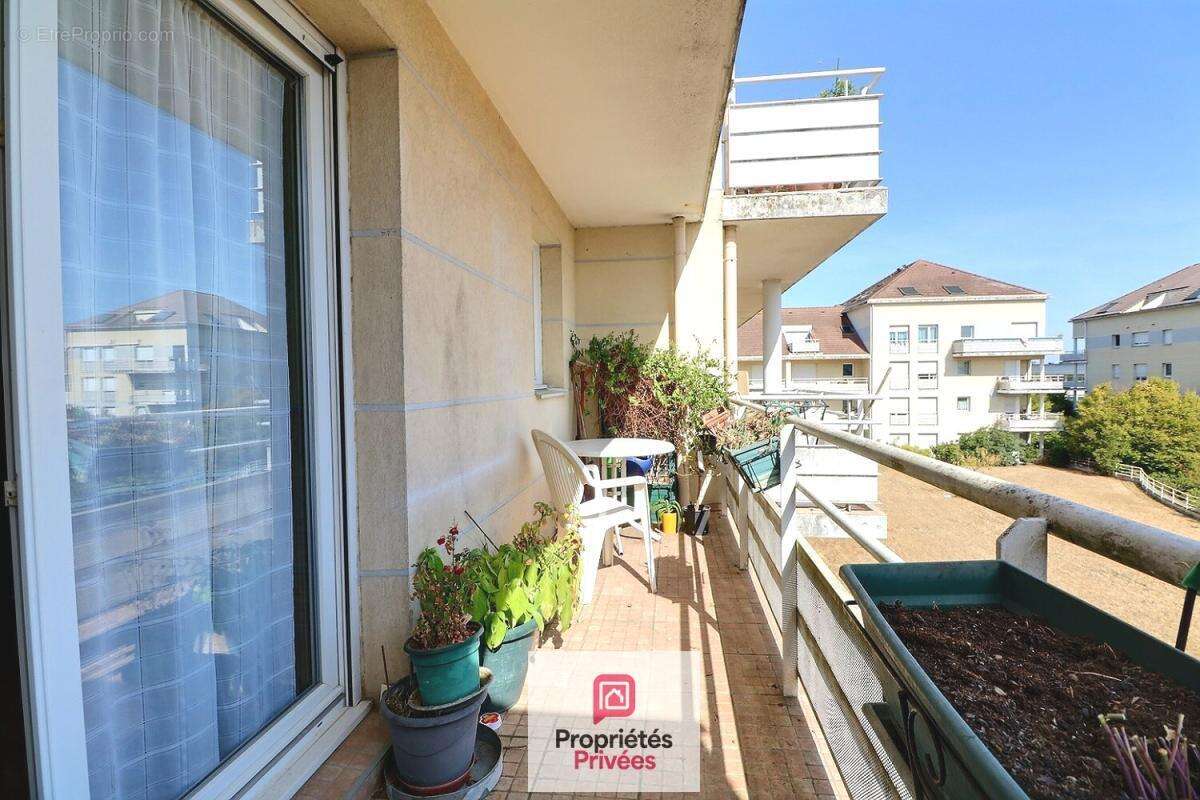 Appartement Acheres 3 pièce(s) 65.49 m2 - photo 2