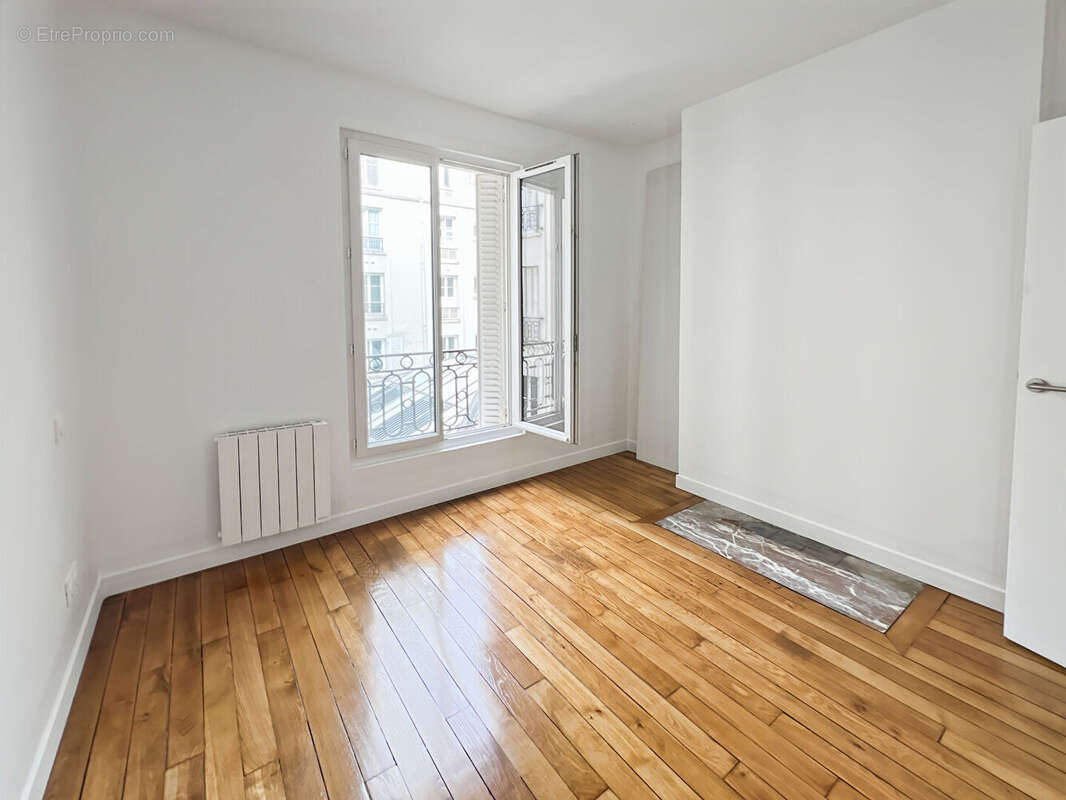 Appartement Paris 3 pièce(s) 39 m2 - photo 2
