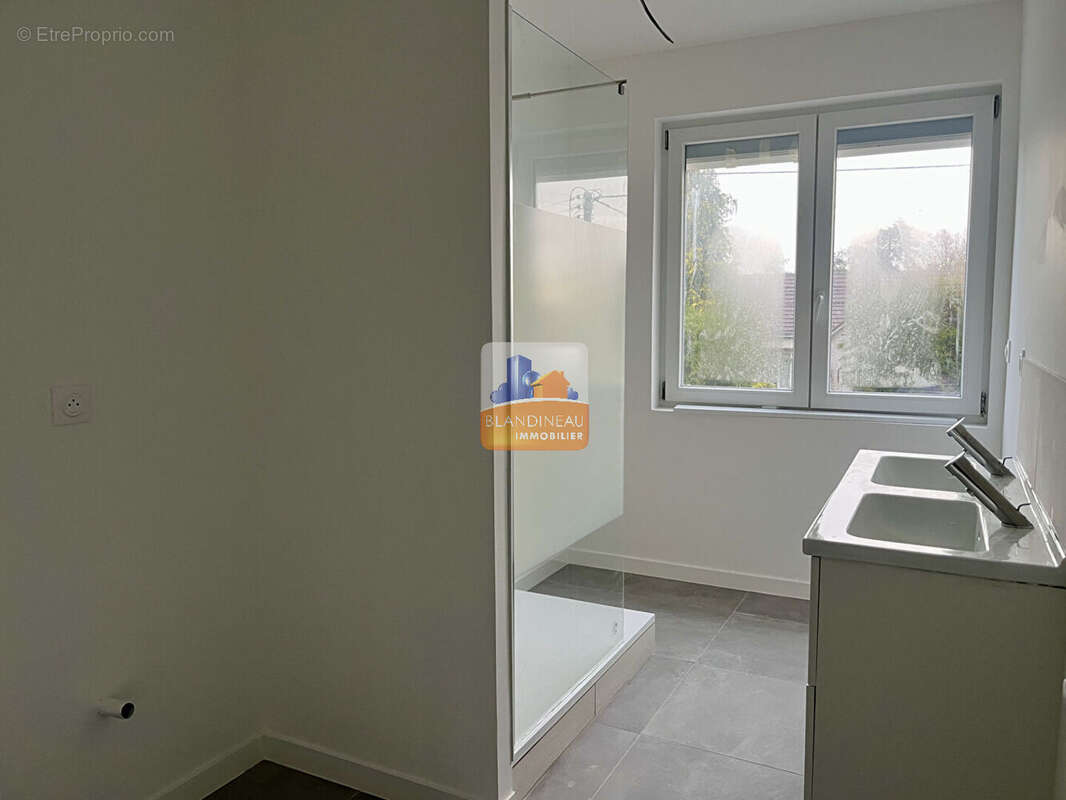 Appartement à BOUGUENAIS