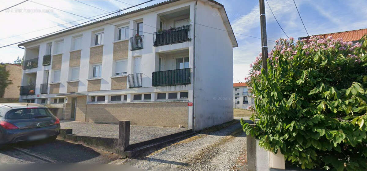 Immeuble de rapport  4 appartements + 6 garages - investissement locatif - photo 6