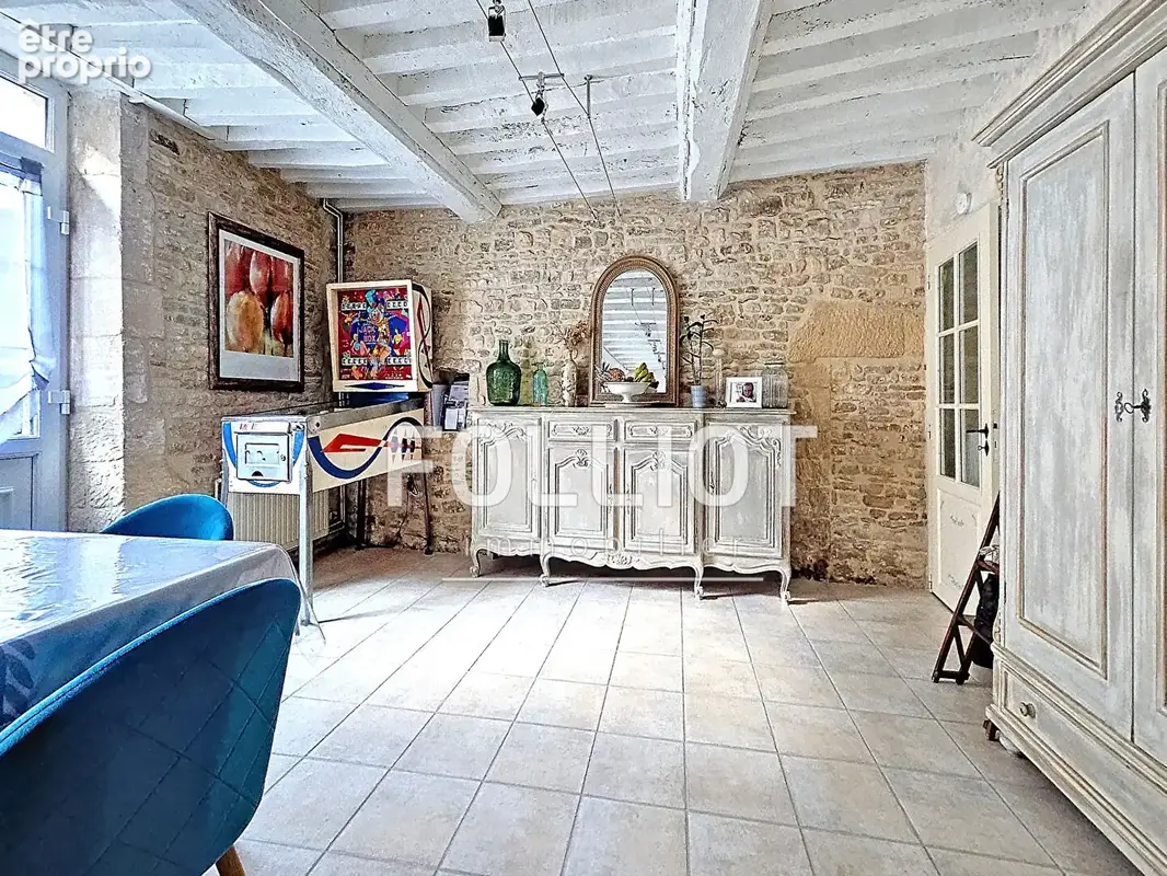 Maison en PIERRE de140 m²  de 7 pièces et 4 chambres avec un garage  àThaon - photo 6