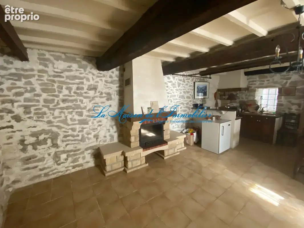 Lezan, charmante maison du XIIeme siècle de village en pierres F2/F3 plus une pièce de 26 m2 - photo 4